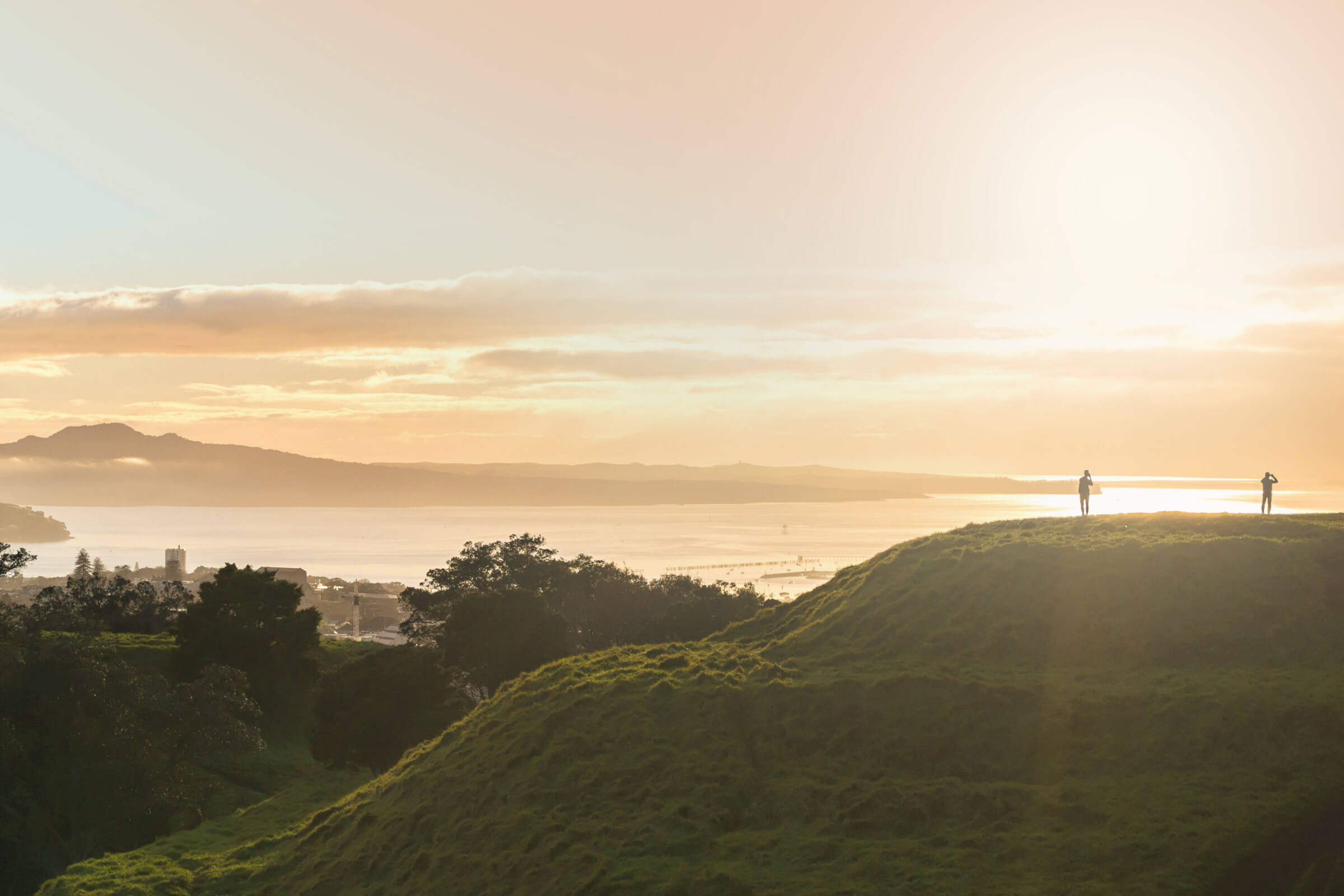 Sunrise over Mt Eden looking through to Rangitoto Island